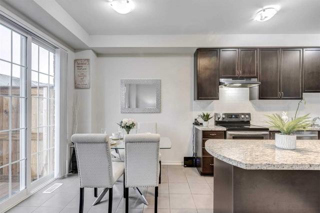 70 Utopia Way, House attached with 3 bedrooms, 4 bathrooms and 1 parking in Brampton ON | Image 5
