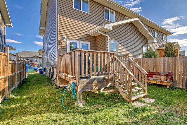 117 Henderson Crescent, Home with 3 bedrooms, 1 bathrooms and 2 parking in Penhold AB | Image 34