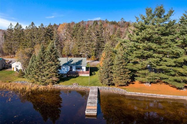 97 Golf Course Rd, House detached with 2 bedrooms, 1 bathrooms and 4 parking in Magnetawan ON | Card Image