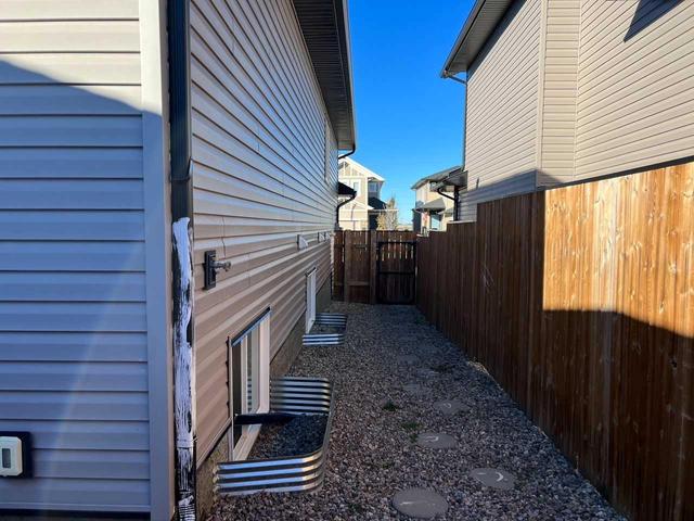 47 Alma Isobell Hodder Crescent N, House detached with 4 bedrooms, 2 bathrooms and 5 parking in Lethbridge AB | Image 34