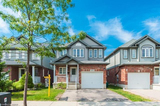 680 Winterberry Avenue, House detached with 3 bedrooms, 2 bathrooms and 3 parking in Waterloo ON | Card Image