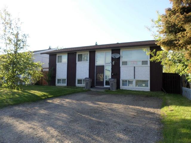 9308 103 Ave, House detached with 3 bedrooms, 2 bathrooms and 6 parking in Grande Prairie AB | Card Image