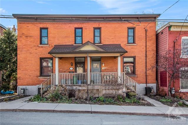 236 Booth Street, Home with 4 bedrooms, 2 bathrooms and 1 parking in Ottawa ON | Image 1