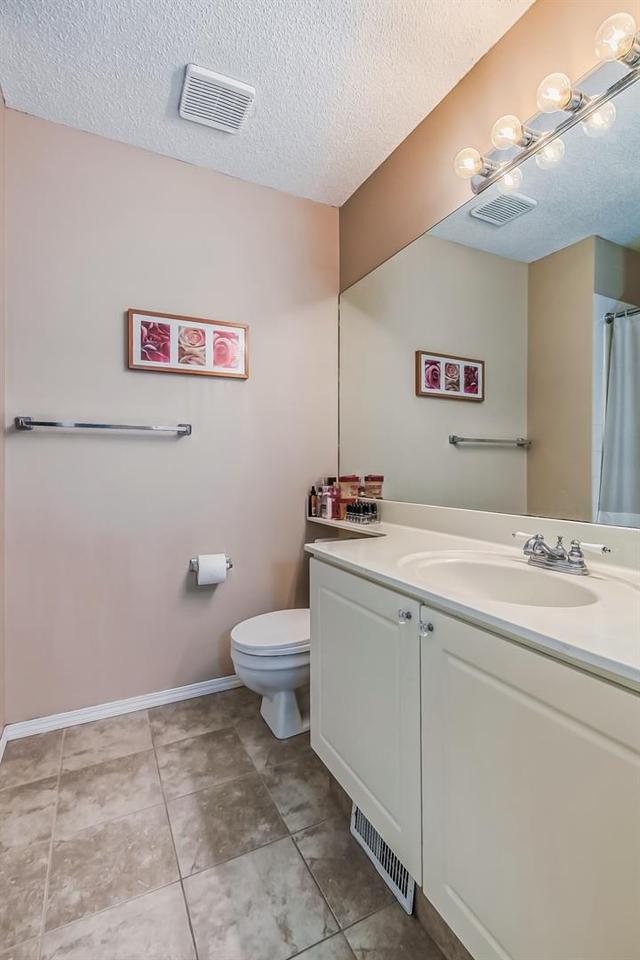 19 Millrose Place Sw, Home with 3 bedrooms, 2 bathrooms and 2 parking in Calgary AB | Image 22