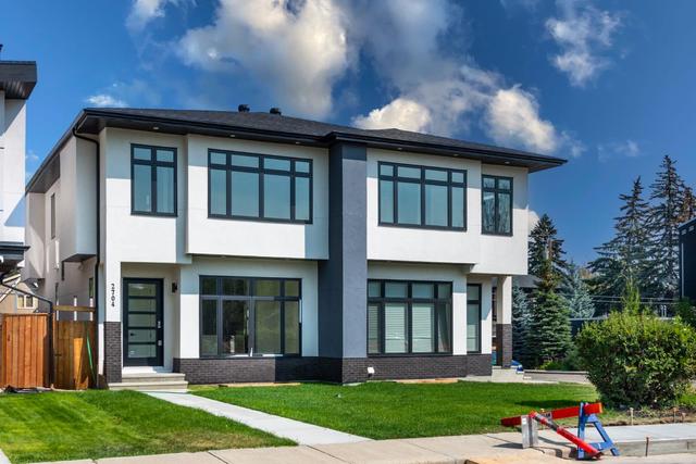 2704 5 Avenue Nw, Home with 4 bedrooms, 3 bathrooms and 2 parking in Calgary AB | Image 2