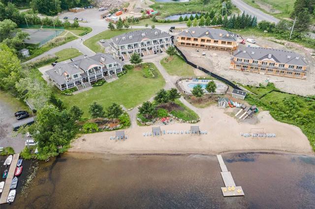 bhvc103 - 1869 Muskoka Rd 118 Rd W, Condo with 2 bedrooms, 2 bathrooms and 1 parking in Muskoka Lakes ON | Image 2