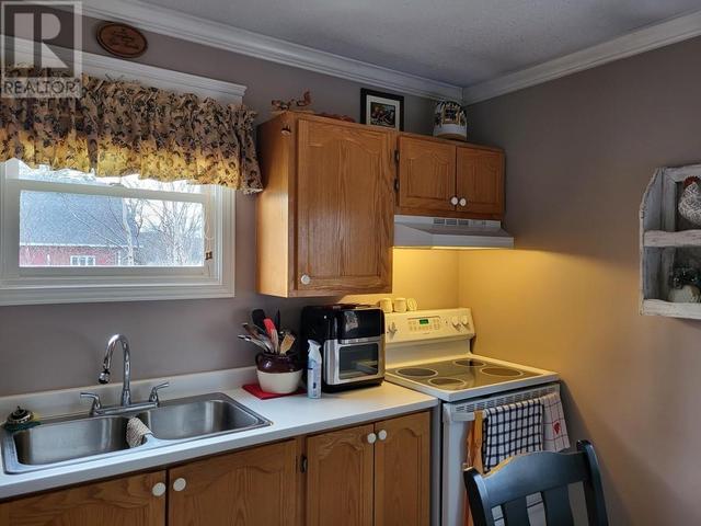 94 Comfort Cove Road, House detached with 2 bedrooms, 1 bathrooms and null parking in Campbellton NL | Image 8