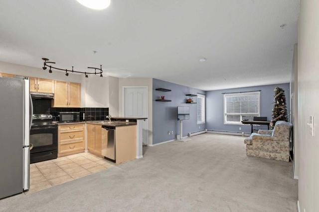 1124 - 60 Panatella Street Nw, Condo with 2 bedrooms, 2 bathrooms and 1 parking in Calgary AB | Image 1