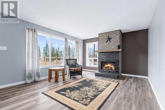Livingroom with Wood burning Fireplace | Image 6