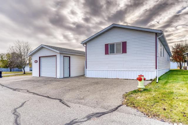 242 Ranchwood Lane, Home with 3 bedrooms, 2 bathrooms and 3 parking in Wheatland County AB | Image 2