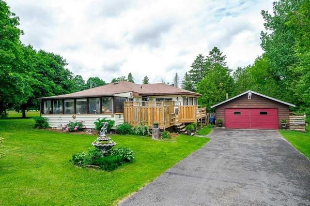 205 Parkside Dr, House detached with 2 bedrooms, 1 bathrooms and 8 parking in Trent Lakes ON | Image 1