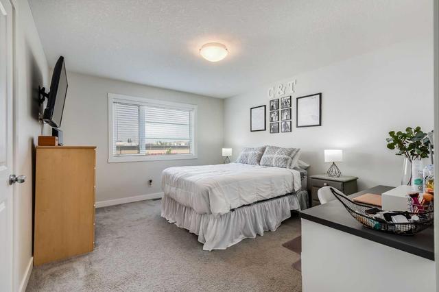 30 Midtown Boulevard Sw, Home with 3 bedrooms, 2 bathrooms and 2 parking in Airdrie AB | Image 11