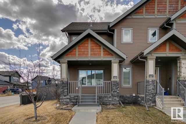 145 Hawks Ridge Bv Nw, House semidetached with 4 bedrooms, 3 bathrooms and null parking in Edmonton AB | Image 2