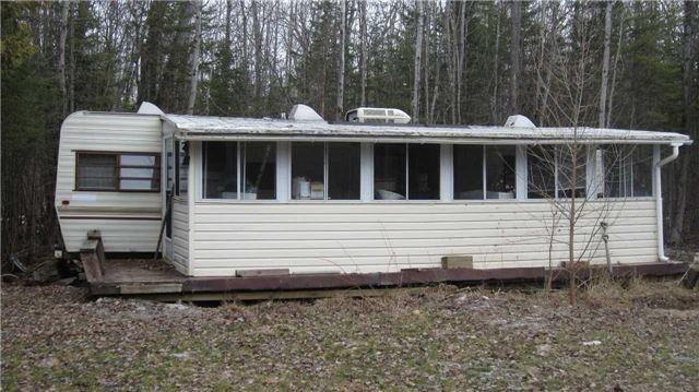 56 Fire Route 104, House detached with 2 bedrooms, 2 bathrooms and 10 parking in Trent Lakes ON | Image 3