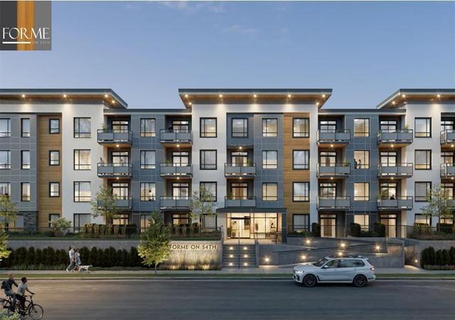 104 - 19825 54 Avenue, Condo with 2 bedrooms, 2 bathrooms and 1 parking in Langley BC | Image 2