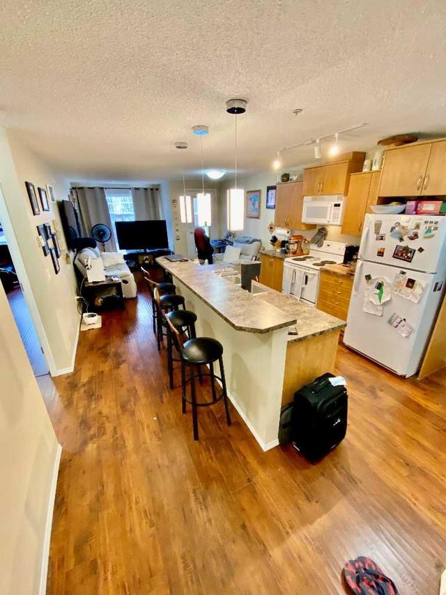 2324 - 700 Willowbrook Road Nw, Condo with 2 bedrooms, 2 bathrooms and 2 parking in Airdrie AB | Image 2