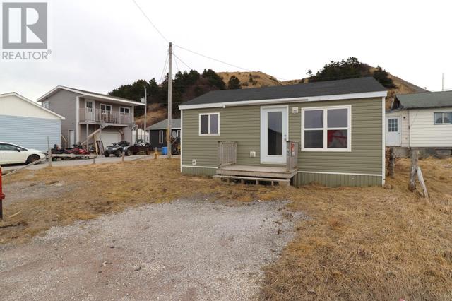 272 Main Street, House detached with 2 bedrooms, 1 bathrooms and null parking in Trout River NL | Image 2