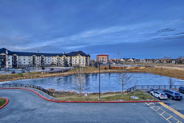 6304 - 304 Mackenzie Way Sw, Condo with 2 bedrooms, 1 bathrooms and 1 parking in Airdrie AB | Image 24