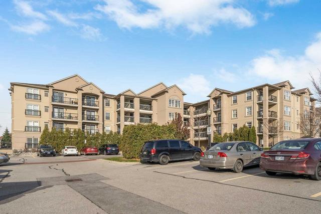 203 - 1380 Main St E, Condo with 2 bedrooms, 1 bathrooms and 1 parking in Milton ON | Image 1