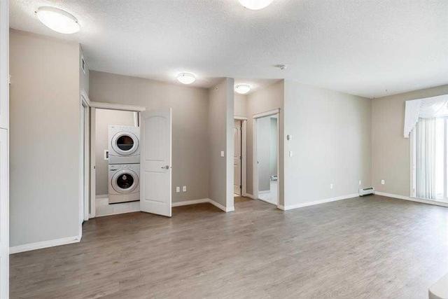 1407 - 522 Cranford Drive Se, Condo with 2 bedrooms, 2 bathrooms and 1 parking in Calgary AB | Image 9