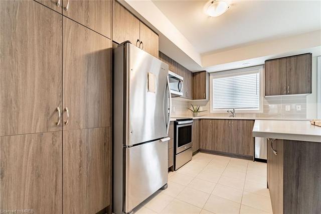 6 - 122 Watson Parkway, House attached with 3 bedrooms, 2 bathrooms and 3 parking in Guelph ON | Image 3
