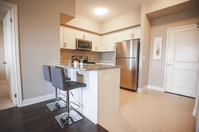 403 - 630 Sauve St, Condo with 2 bedrooms, 2 bathrooms and 1 parking in Milton ON | Image 3