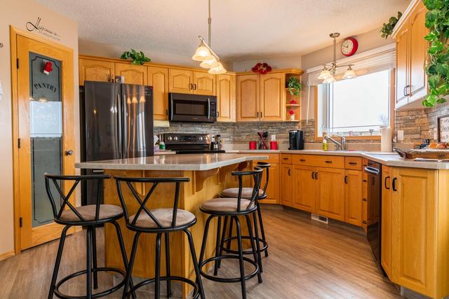 451048 Rg Rd 74, House detached with 5 bedrooms, 3 bathrooms and 6 parking in Wainwright No. 61 AB | Image 11