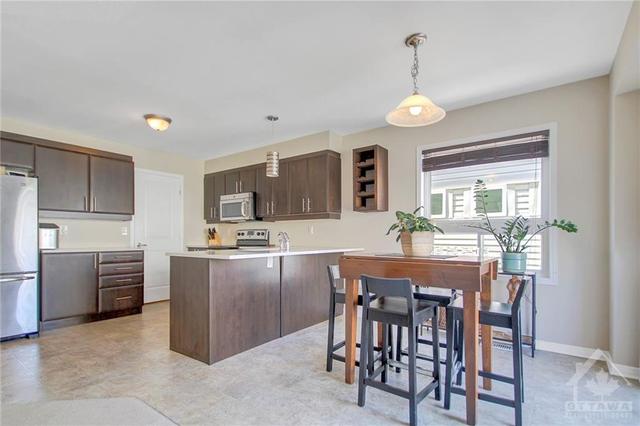 Plenty of cabinet and counter space in Kitchen. | Image 13