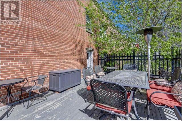 Lovely shared patio right beside the unit! | Image 26
