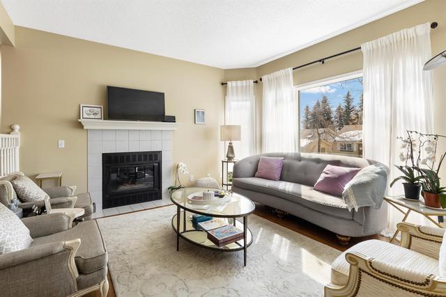 18 Stradwick Rise Sw, Home with 4 bedrooms, 2 bathrooms and 4 parking in Calgary AB | Image 2