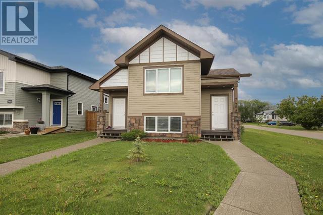 748 Cypress Lane, Home with 4 bedrooms, 2 bathrooms and 2 parking in Red Deer County AB | Card Image