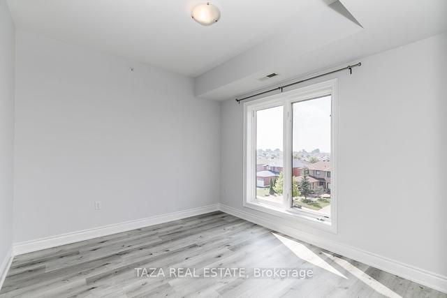 302 - 100 Dean Ave, Condo with 3 bedrooms, 2 bathrooms and 1 parking in Barrie ON | Image 13