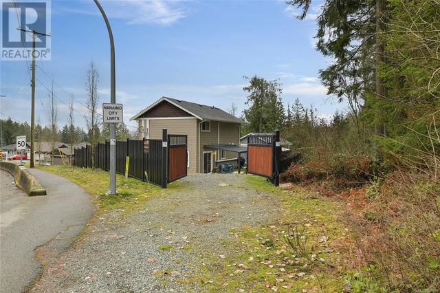 2382/2380 Extension Rd, House detached with 6 bedrooms, 6 bathrooms and 6 parking in Nanaimo C BC | Image 55