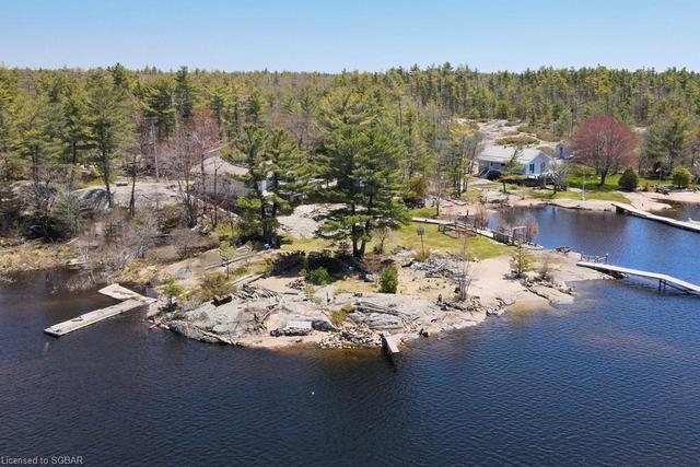 27142 Georgian Bay Shore, House detached with 3 bedrooms, 1 bathrooms and null parking in Georgian Bay ON | Image 3