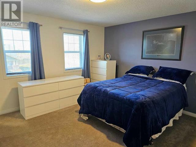 2, - 402 Couleecreek Boulevard S, House attached with 2 bedrooms, 2 bathrooms and 2 parking in Lethbridge AB | Image 19