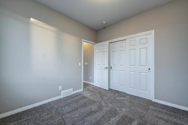 625 Windrow Manor Sw, House detached with 3 bedrooms, 2 bathrooms and 4 parking in Calgary AB | Image 2