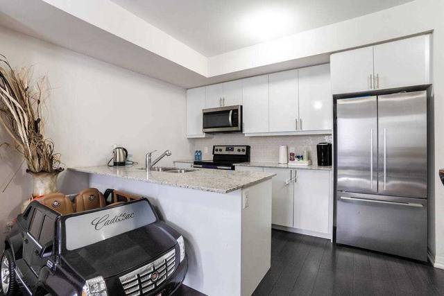 105 - 1206 Main St E, Townhouse with 2 bedrooms, 3 bathrooms and 1 parking in Milton ON | Image 3