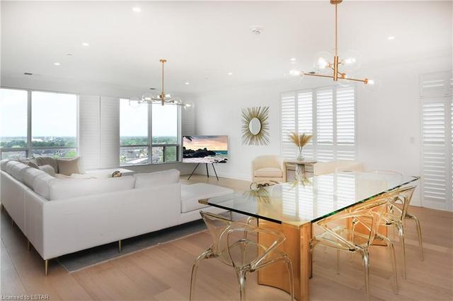 Blanco pot filler, 36 inch ceramic cooktop and continuation of countertop up the back wall of the kitchen | Image 16