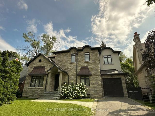 128 Thompson Ave, House detached with 3 bedrooms, 5 bathrooms and 3 parking in Toronto ON | Image 12
