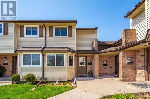 11 - 40 Silvercreek Parkway N, House attached with 2 bedrooms, 1 bathrooms and 1 parking in Guelph ON | Card Image