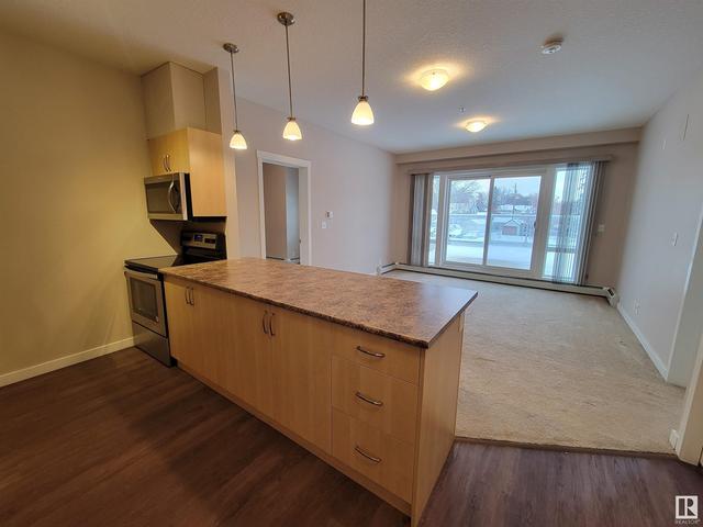 207 - 9113 111 Av Nw, Condo with 2 bedrooms, 2 bathrooms and null parking in Edmonton AB | Image 1