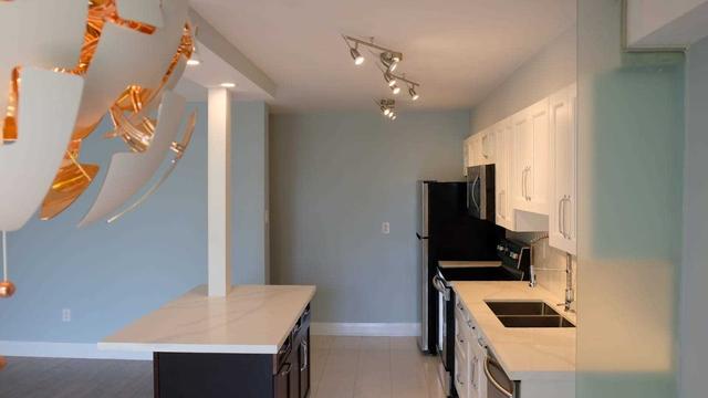 309 - 177 Linus Rd, Condo with 2 bedrooms, 1 bathrooms and 1 parking in Toronto ON | Image 20
