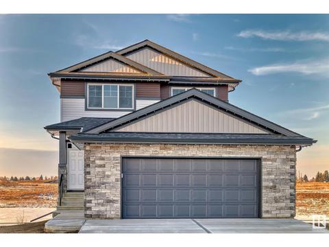10206 92a Av, House detached with 3 bedrooms, 2 bathrooms and null parking in Morinville AB | Card Image