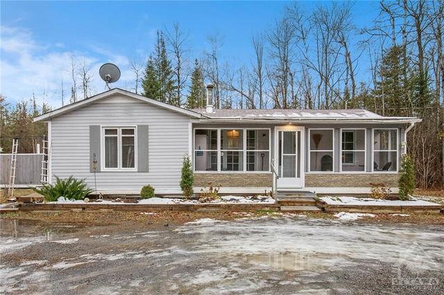 690 Monkman Road, House detached with 2 bedrooms, 1 bathrooms and 8 parking in North Grenville ON | Card Image