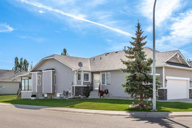 644 Riverside Boulevard Nw, Home with 2 bedrooms, 2 bathrooms and 4 parking in High River AB | Image 1