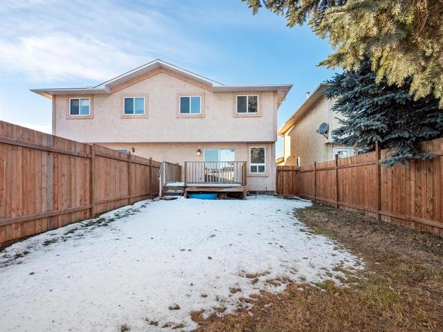 84 Martinglen Way Ne, Home with 4 bedrooms, 2 bathrooms and 2 parking in Calgary AB | Image 12