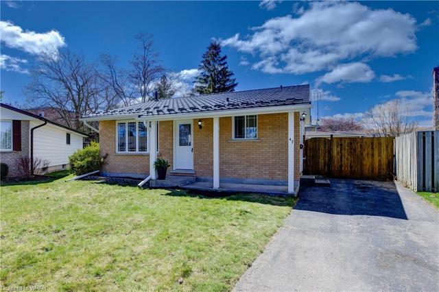Situated on a pie-shaped lot in a family-friendly neighbourhood, this sidewalk-free home features a deep driveway with ample parking for 3+ vehicles and a good-sized storage building, adding convenience and practicality. | Image 21