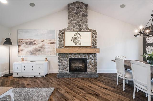 12' stone fireplace with framed TV | Image 6
