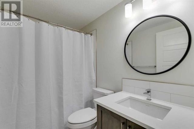 215, - 338 Seton Circle Se, House attached with 2 bedrooms, 1 bathrooms and 1 parking in Calgary AB | Image 7