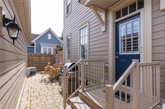 Back door leading to the courtyard and garage. Gas BBQ hook-up as well. | Image 18